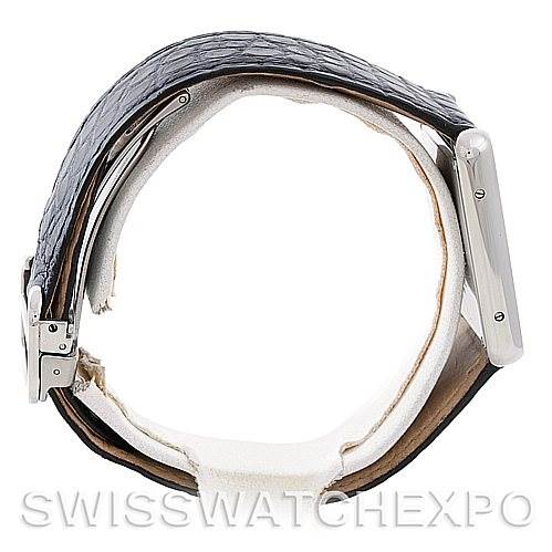 This image shows a side view of a Cartier Tank Solo W1018355 Men
s Stainless Steel Silver Dial W1018355 Men
s Stainless Steel Silver Dial watch, highlighting its leather strap and case.