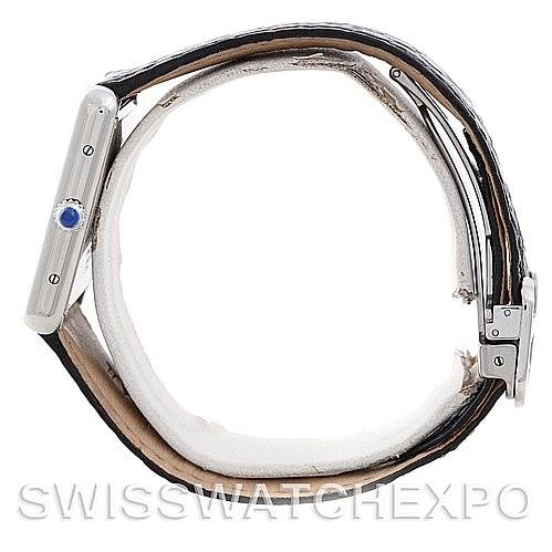 This image shows a side view of the Cartier Tank Solo W1018355 Men
s Stainless Steel Silver Dial W1018355 Men
s Stainless Steel Silver Dial watch, displaying the crown and part of the leather strap.