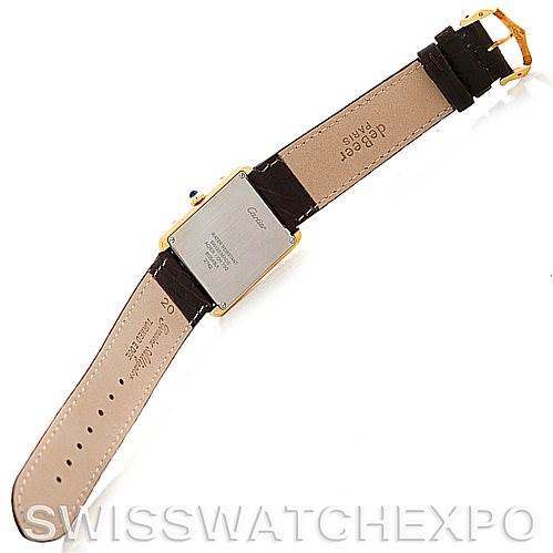 The image shows the back view of a Cartier Tank Solo W1018855 Men
s Steel and Gold (two tone) Silver Dial W1018855 Men
s Steel and Gold (two tone) Silver Dial watch, displaying the case back, leather strap, and buckle.