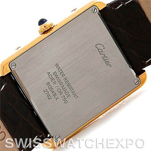 The image shows the back case of a Cartier Tank Solo W1018855 Men
s Steel and Gold (two tone) Silver Dial W1018855 Men
s Steel and Gold (two tone) Silver Dial watch, featuring the brand name and model details.