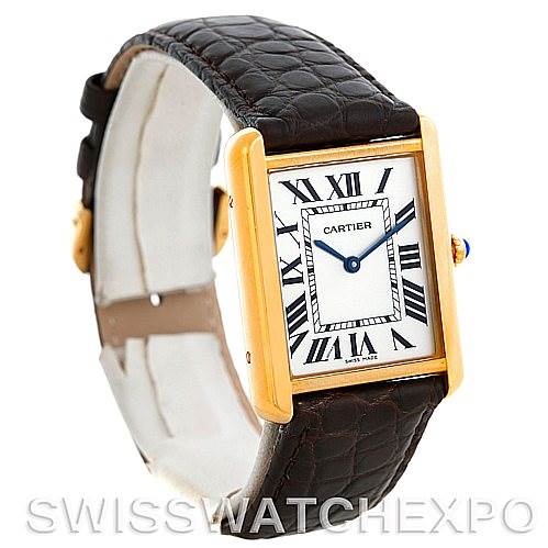 The image shows a Cartier Tank Solo W1018855 Men
s Steel and Gold (two tone) Silver Dial W1018855 Men
s Steel and Gold (two tone) Silver Dial watch at a three-quarter angle, displaying its face, strap, and side crown.