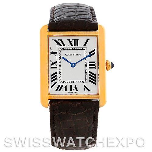The image shows a front view of the Cartier Tank Solo W1018855 Men
s Steel and Gold (two tone) Silver Dial W1018855 Men
s Steel and Gold (two tone) Silver Dial model watch, featuring a gold case, white dial with Roman numerals, and black leather strap.