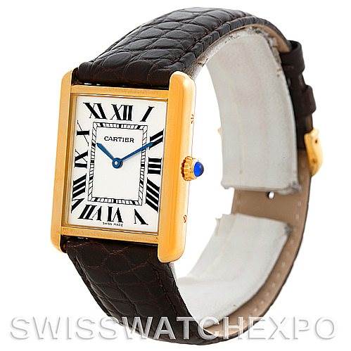 This image shows a Cartier Tank Solo W1018855 Men
s Steel and Gold (two tone) Silver Dial W1018855 Men
s Steel and Gold (two tone) Silver Dial watch at a slight angle, highlighting its rectangular face, Roman numerals, and leather strap.