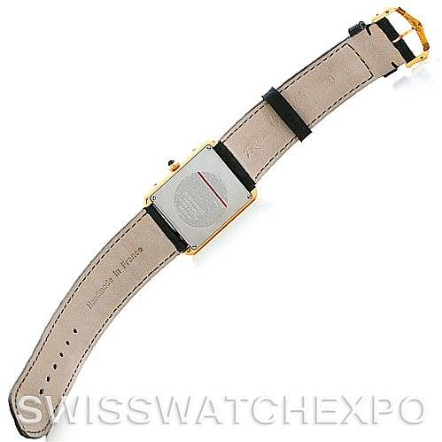 The image shows the back view of a Cartier Tank Solo W1018855 Men
s Steel and Gold (two tone) Silver Dial W1018855 Men
s Steel and Gold (two tone) Silver Dial watch, highlighting the leather strap and metal caseback.