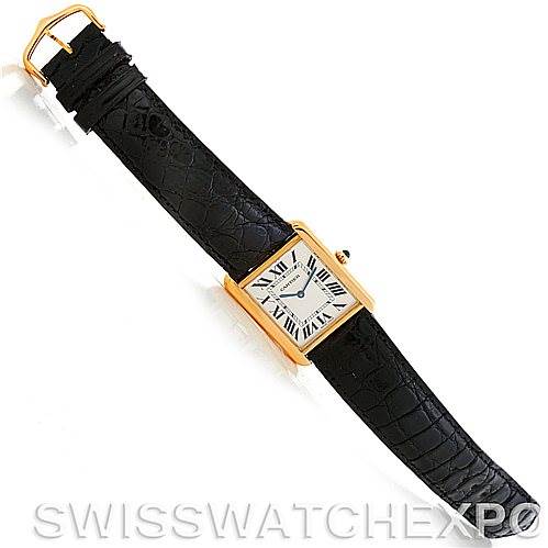 This image shows a top-down view of a Cartier Tank Solo W1018855 Men
s Steel and Gold (two tone) Silver Dial W1018855 Men
s Steel and Gold (two tone) Silver Dial watch, highlighting the watch face and black leather strap.