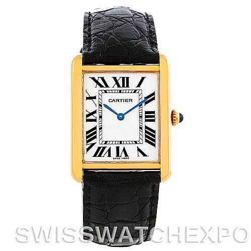 The image shows a front view of a Cartier Tank Solo W1018855 Men
s Steel and Gold (two tone) Silver Dial W1018855 Men
s Steel and Gold (two tone) Silver Dial watch, featuring a black leather strap and a gold rectangular case with Roman numerals.