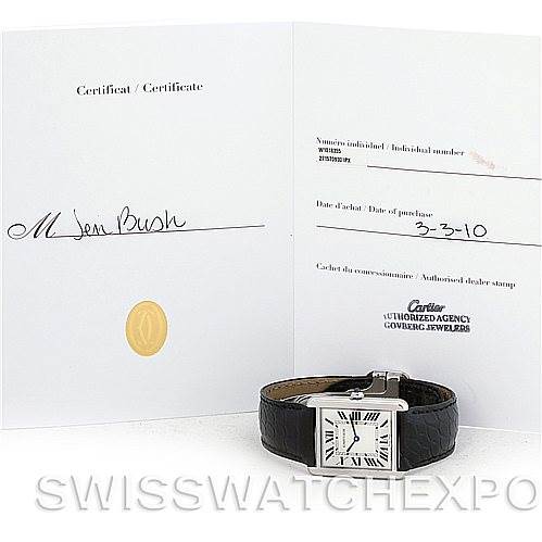 The image shows a Cartier Tank Solo W1018355 Men
s Stainless Steel Silver Dial W1018355 Men
s Stainless Steel Silver Dial watch with its certificate, viewed from the front.