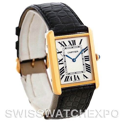 The image shows a Cartier Tank Solo W1018855 Men
s Steel and Gold (two tone) Silver Dial W1018855 Men
s Steel and Gold (two tone) Silver Dial watch from an angled front view, featuring its rectangular face and black leather strap.