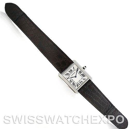 The Cartier Tank Solo W1018355 Men
s Stainless Steel Silver Dial W1018355 Men
s Stainless Steel Silver Dial watch is shown from a top-down angle, displaying the full face, case, and both ends of the leather strap.