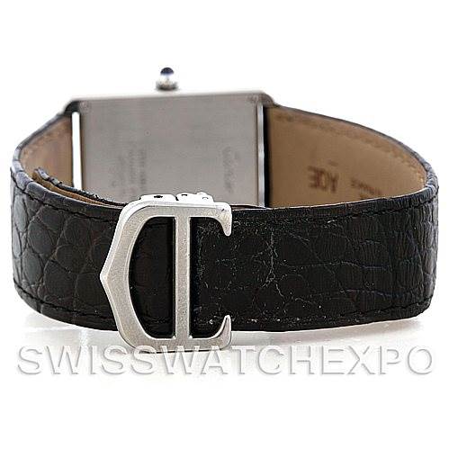 The image shows the back view of the Cartier Tank Solo W1018355 Men
s Stainless Steel Silver Dial W1018355 Men
s Stainless Steel Silver Dial watch, highlighting the black leather strap and "C" buckle.