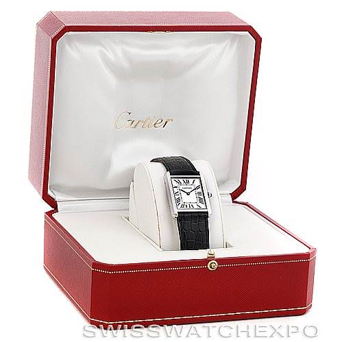 The Cartier Tank Solo W1018355 Men's Stainless Steel Silver Dial W1018355 Men's Stainless Steel Silver Dial watch is displayed frontally inside a red and white box with a gold logo.