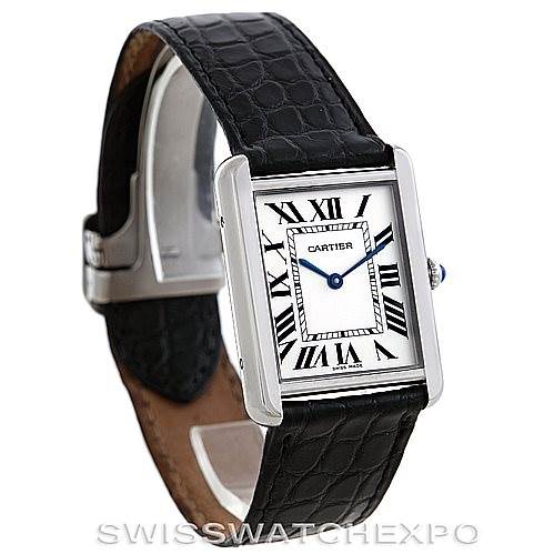 The image shows a Cartier Tank Solo W1018355 Men's Stainless Steel Silver Dial W1018355 Men's Stainless Steel Silver Dial watch from a three-quarter angle, highlighting the face, Roman numeral dial, black leather strap, and clasp.