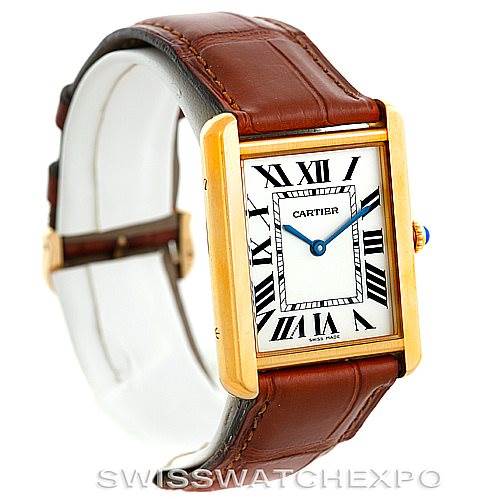 The image shows a Cartier Tank Solo W1018855 Men
s Steel and Gold (two tone) Silver Dial W1018855 Men
s Steel and Gold (two tone) Silver Dial watch at an angle highlighting the face, case, crown, and leather strap.