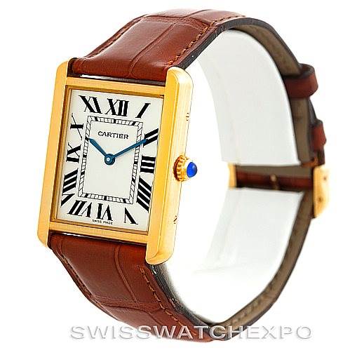 This image shows a Cartier Tank Solo W1018855 Men
s Steel and Gold (two tone) Silver Dial W1018855 Men
s Steel and Gold (two tone) Silver Dial watch angled slightly from the front and side, displaying its face, bezel, and brown leather strap.
