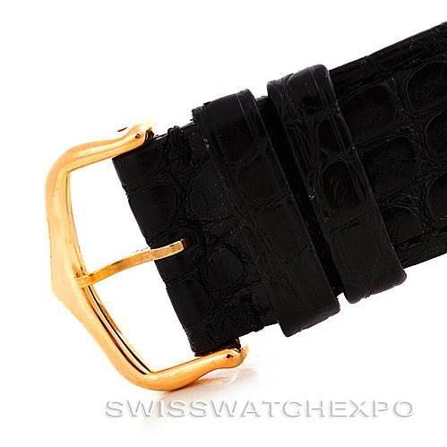 This image shows a close-up of the gold buckle and black leather strap of a Cartier Tank Solo W1018855 Men
s Steel and Gold (two tone) Silver Dial W1018855 Men
s Steel and Gold (two tone) Silver Dial watch.