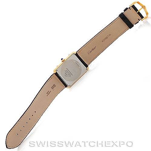 This image shows the backside of a Cartier Tank Solo W1018855 Men
s Steel and Gold (two tone) Silver Dial W1018855 Men
s Steel and Gold (two tone) Silver Dial model watch, displaying the back case and leather straps.