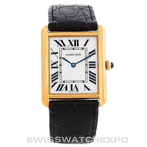 The image shows a front view of the Cartier Tank Solo W1018855 Men
s Steel and Gold (two tone) Silver Dial W1018855 Men
s Steel and Gold (two tone) Silver Dial watch featuring its rectangular face, roman numerals, and black leather strap.