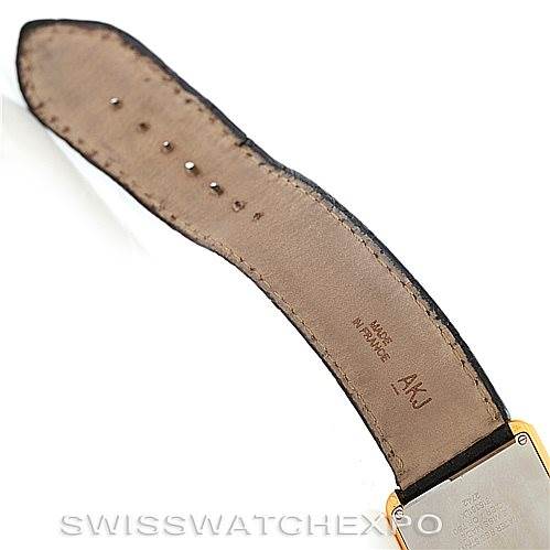 This image shows the leather strap and part of the back of a Cartier Tank Solo W1018855 Men
s Steel and Gold (two tone) Silver Dial W1018855 Men
s Steel and Gold (two tone) Silver Dial watch.