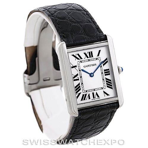 The image shows a Cartier Tank Solo W1018355 Men
s Stainless Steel Silver Dial W1018355 Men
s Stainless Steel Silver Dial watch at a left-angled view, highlighting the face, Roman numerals, and black leather strap.
