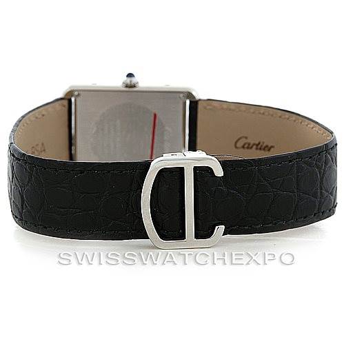 The image shows the back view of a Cartier Tank Solo W1018355 Men
s Stainless Steel Silver Dial W1018355 Men
s Stainless Steel Silver Dial watch, featuring its black leather strap and clasp.