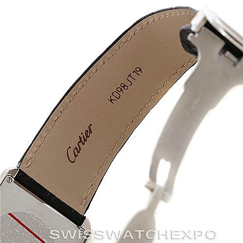 The image shows the inner side of the leather strap of a Cartier Tank Solo W1018355 Men
s Stainless Steel Silver Dial W1018355 Men
s Stainless Steel Silver Dial watch with brand markings and serial number.