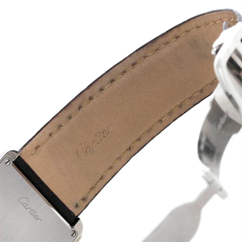 The image shows the interior leather strap and part of the clasp and case back of a Cartier Tank Solo W1018355 Men
s Stainless Steel Silver Dial W1018355 Men
s Stainless Steel Silver Dial watch.