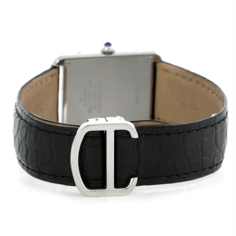 The image shows the back view of a Cartier Tank Solo W1018355 Men
s Stainless Steel Silver Dial W1018355 Men
s Stainless Steel Silver Dial watch, highlighting its black leather strap and buckle.