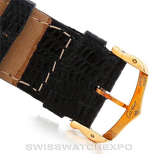 The image shows a close-up of the clasp and part of the strap of a Cartier Tank Solo W1018855 Men
s Steel and Gold (two tone) Silver Dial W1018855 Men
s Steel and Gold (two tone) Silver Dial watch.