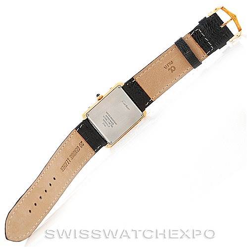 This image shows the back view of the Tank Solo model by Cartier, highlighting the watch
s case back and leather strap.