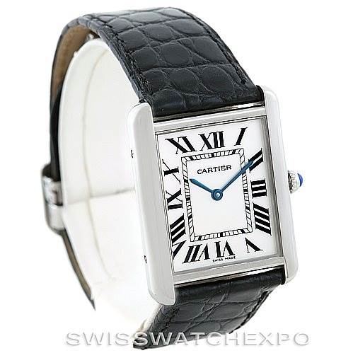 This image shows a Cartier Tank Solo W1018355 Men
s Stainless Steel Silver Dial W1018355 Men
s Stainless Steel Silver Dial watch at an angled front view, highlighting its face, Roman numerals, case, and leather strap.