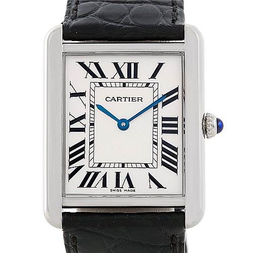 The image shows a frontal view of the Cartier Tank Solo W1018355 Men
s Stainless Steel Silver Dial W1018355 Men
s Stainless Steel Silver Dial watch, highlighting the face, Roman numerals, and blue hands.