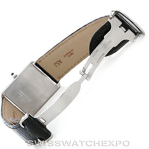 The image shows the side angle of a Cartier Tank Solo W1018355 Men
s Stainless Steel Silver Dial W1018355 Men
s Stainless Steel Silver Dial watch, focusing on the open clasp and partial view of the leather strap.