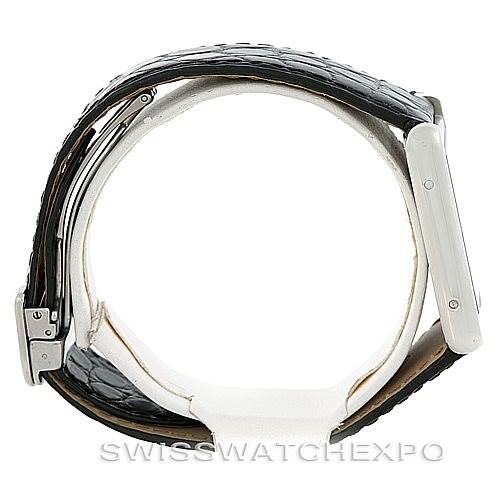 The image shows a side view of the Cartier Tank Solo W1018355 Men
s Stainless Steel Silver Dial W1018355 Men
s Stainless Steel Silver Dial watch, highlighting the case and the black leather strap.