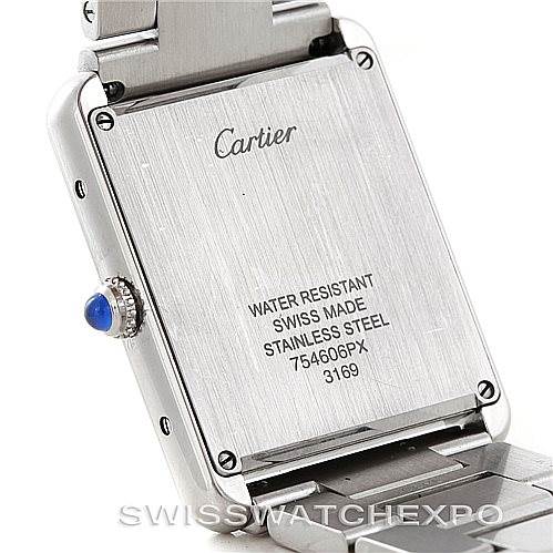 The image shows the back case of a Cartier Tank Solo W5200014 Men
s Stainless Steel Silver Dial W5200014 Men
s Stainless Steel Silver Dial watch, highlighting its water resistance, stainless steel material, and serial numbers.
