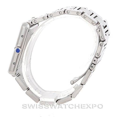 The image shows a Cartier Tank Solo W5200014 Men
s Stainless Steel Silver Dial W5200014 Men
s Stainless Steel Silver Dial watch from a side angle, highlighting the bracelet and the blue cabochon crown.