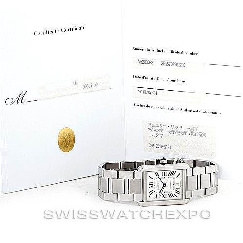 The image shows a Cartier Tank Solo W5200028 Men
s Stainless Steel Silver Dial W5200028 Men
s Stainless Steel Silver Dial watch with its certificate and warranty card viewed from the front.