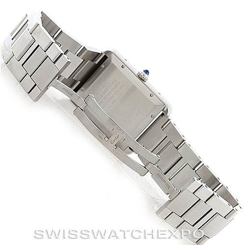 The image shows the back and bracelet of a Cartier Tank Solo W5200028 Men
s Stainless Steel Silver Dial W5200028 Men
s Stainless Steel Silver Dial watch, focusing on the clasp and engraved case back.