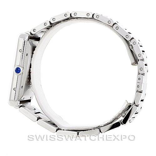The Cartier Tank Solo W5200028 Men
s Stainless Steel Silver Dial W5200028 Men
s Stainless Steel Silver Dial watch is shown from a side angle, highlighting the watch case, bezel, and part of the metal bracelet.