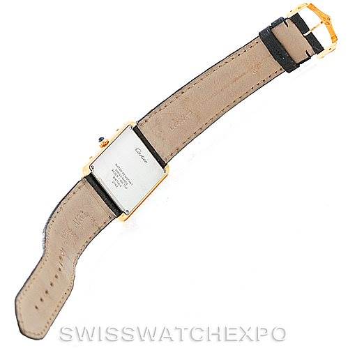 This image shows the back view of a Cartier Tank Solo W1018855 Men's Steel and Gold (two tone) Silver Dial W1018855 Men's Steel and Gold (two tone) Silver Dial watch, displaying its leather strap and case back.
