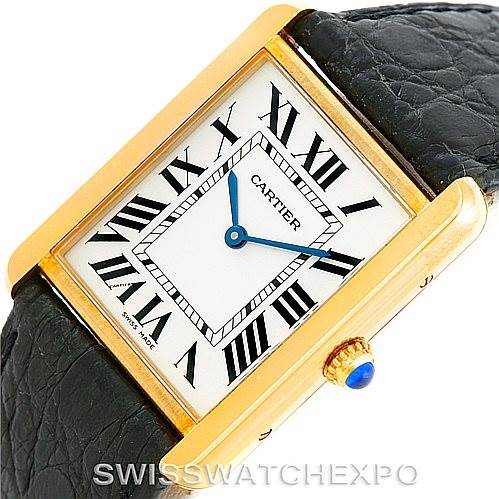 The image shows a close-up angled view of the Cartier Tank Solo W1018855 Men's Steel and Gold (two tone) Silver Dial W1018855 Men's Steel and Gold (two tone) Silver Dial watch face, bezel, crown, and strap.