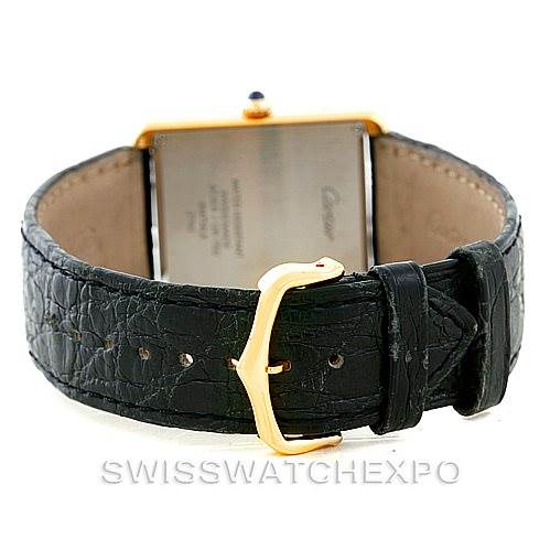 The image shows the backside angle of a Cartier Tank Solo W1018855 Men's Steel and Gold (two tone) Silver Dial W1018855 Men's Steel and Gold (two tone) Silver Dial watch, highlighting the leather strap and clasp.