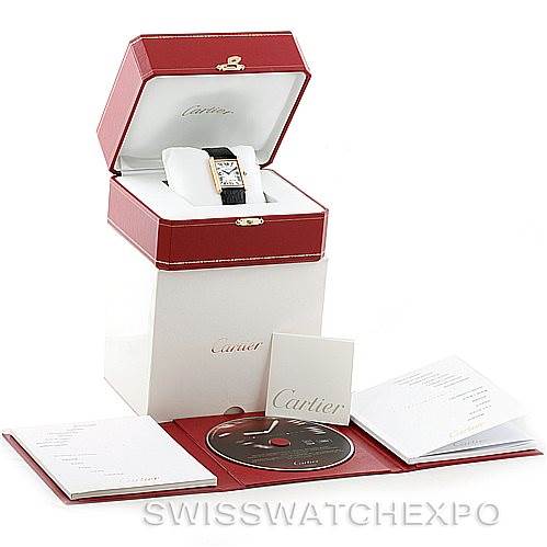The image shows a Cartier Tank Solo W1018855 Men's Steel and Gold (two tone) Silver Dial W1018855 Men's Steel and Gold (two tone) Silver Dial watch along with its red display box, documents, and a CD.