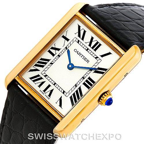 This image shows a Cartier Tank Solo W1018855 Men's Steel and Gold (two tone) Silver Dial W1018855 Men's Steel and Gold (two tone) Silver Dial watch at a slight angle, highlighting the rectangular face, Roman numerals, gold casing, and black leather strap.