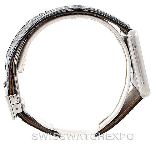 This image shows a side profile of a Cartier Tank Solo W1018355 Men
s Stainless Steel Silver Dial W1018355 Men
s Stainless Steel Silver Dial watch displaying its case, crown, and leather strap.