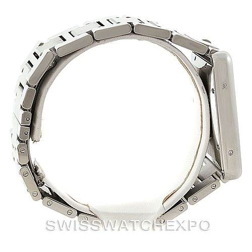 The image shows a side view of a Cartier Tank Solo W5200028 Men
s Stainless Steel Silver Dial W5200028 Men
s Stainless Steel Silver Dial watch, highlighting its metal bracelet and case.