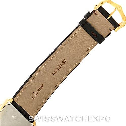 The image shows the underside of the strap and buckle of a Cartier Tank Solo W1018855 Men
s Steel and Gold (two tone) Silver Dial W1018855 Men
s Steel and Gold (two tone) Silver Dial watch.