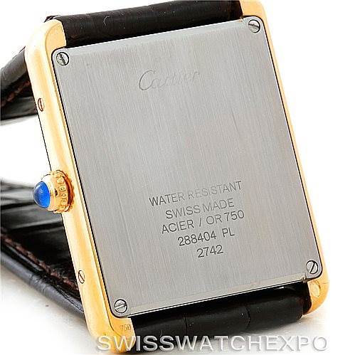 This image shows the back case and crown of the Tank Solo Cartier watch, highlighting its water resistance and material details.