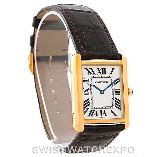 The image shows a Cartier Tank Solo W1018855 Men
s Steel and Gold (two tone) Silver Dial W1018855 Men
s Steel and Gold (two tone) Silver Dial watch at a slight angle, highlighting its face, case, and leather strap.