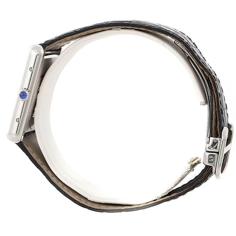 The image shows the Cartier Tank Solo W1018355 Men
s Stainless Steel Silver Dial W1018355 Men
s Stainless Steel Silver Dial watch from a side view, highlighting the crown and the leather strap.
