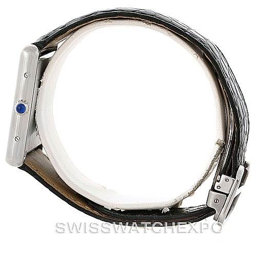 The Cartier Tank Solo W1018355 Men
s Stainless Steel Silver Dial W1018355 Men
s Stainless Steel Silver Dial watch is shown in a side view angle with its crown and strap visible.